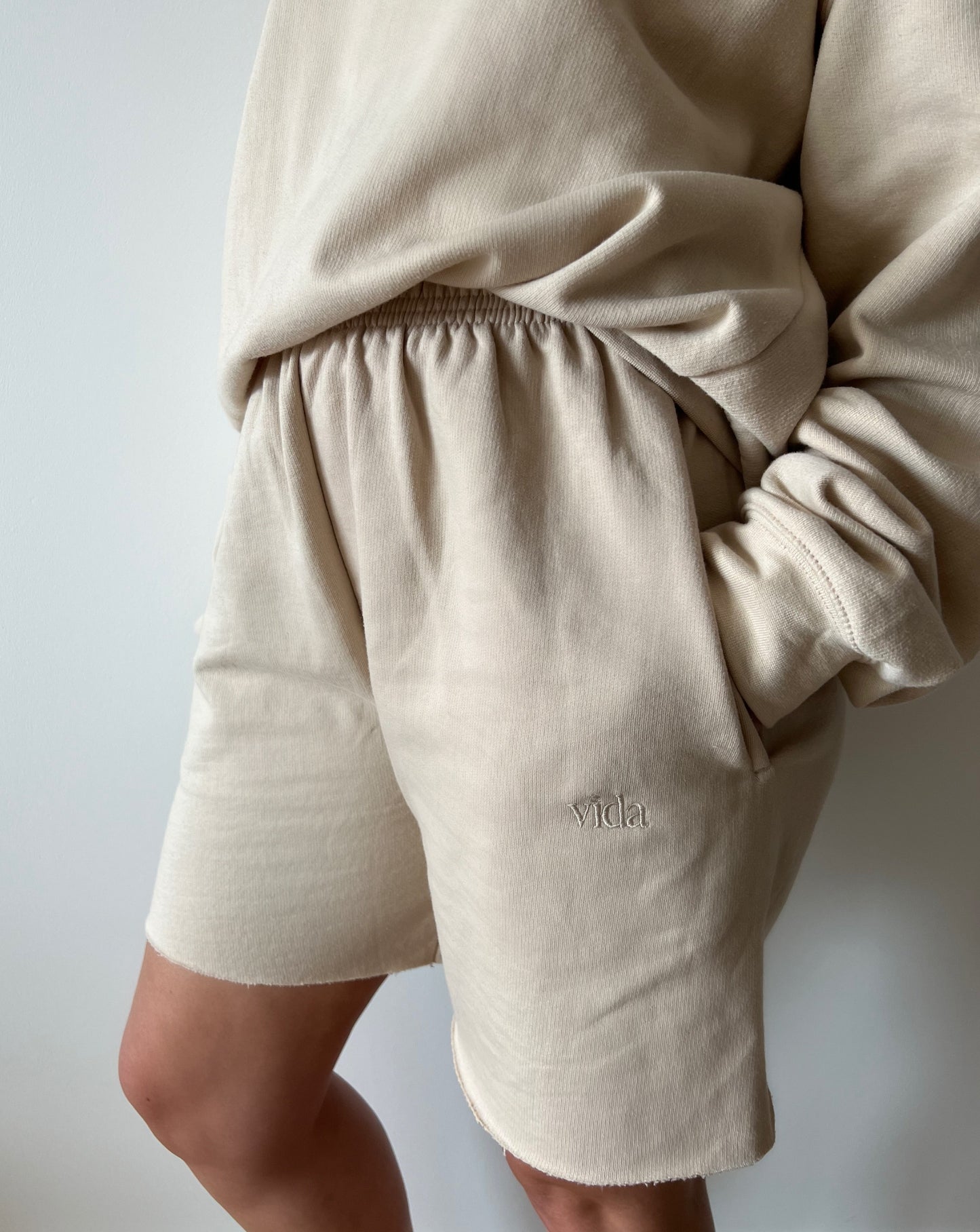 Our sand shorts are the perfect piece to tie together a neutral summer outfit